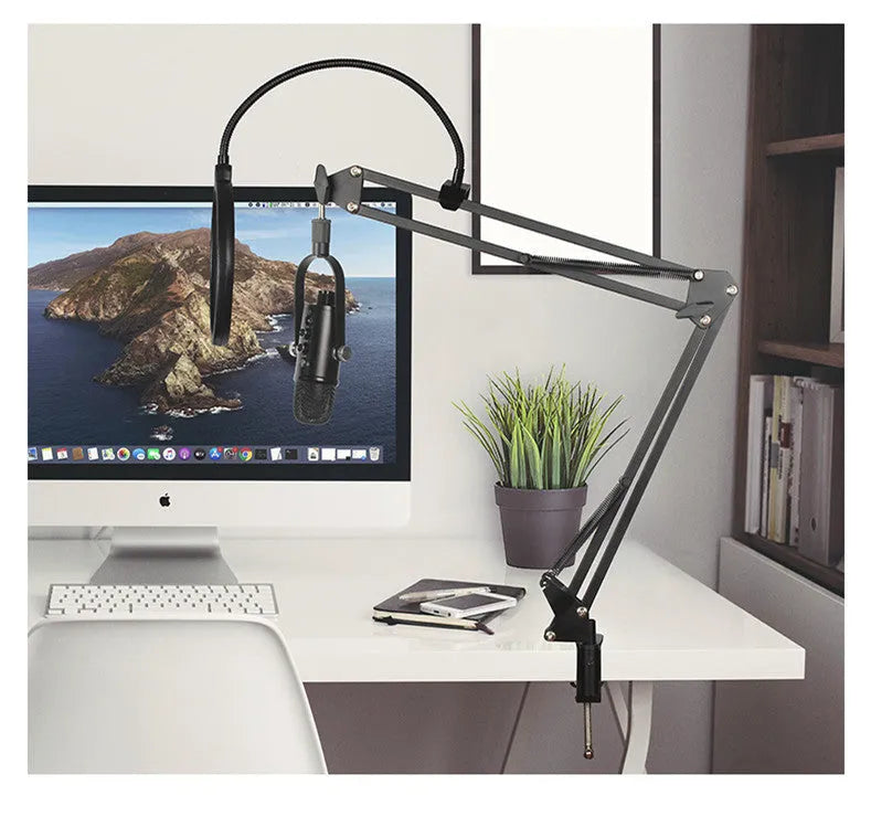 Black BM-86PRO USB condenser microphone on a metal stand with foam windscreen.
