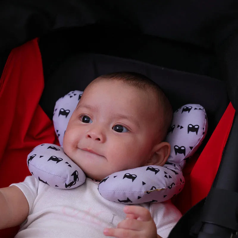 White U-shaped infant pillow with peach fabric cover and PP cotton filling for stroller neck support