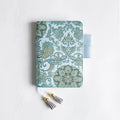 Fabric cover notebook with flying blue flower pattern showing A5 and A6 size options