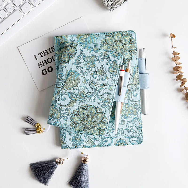 Fabric cover notebook with flying blue flower pattern showing A5 and A6 size options