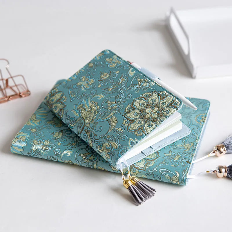 Fabric cover notebook with flying blue flower pattern showing A5 and A6 size options
