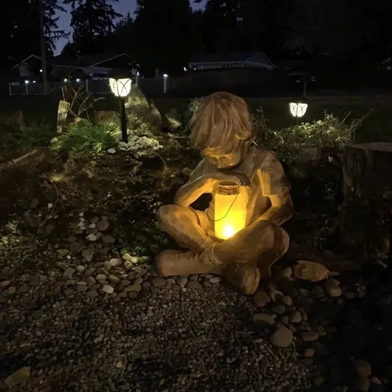 Brown resin garden statue of boy figure for tabletop decoration