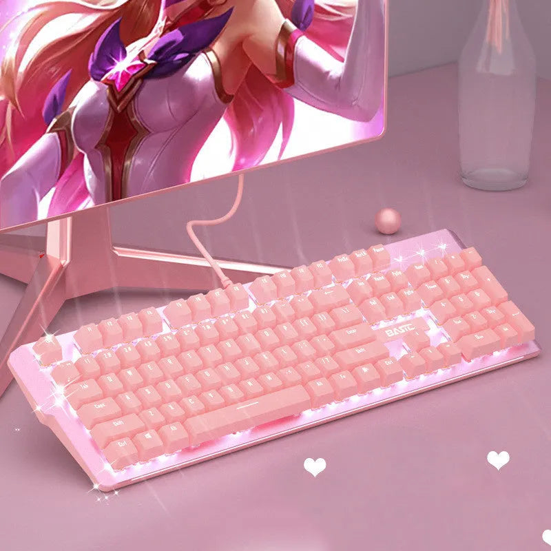 Pink wired mechanical keyboard and matching gaming mouse set on a desk.