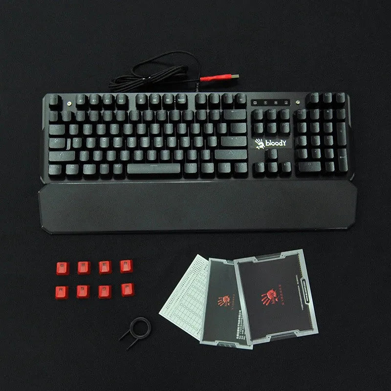 B885N full optical axis mechanical keyboard with green switches, 104 keys, seven-color backlight, and detachable wrist rest on a desk