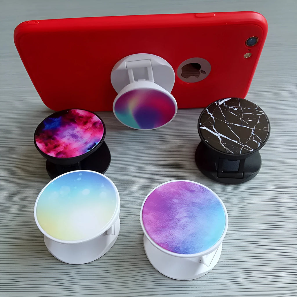Folding mobile phone holder with thermal transfer aluminium sheet option in multiple colours on desktop