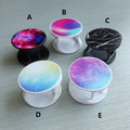 Folding mobile phone holder with thermal transfer aluminium sheet option in multiple colours on desktop