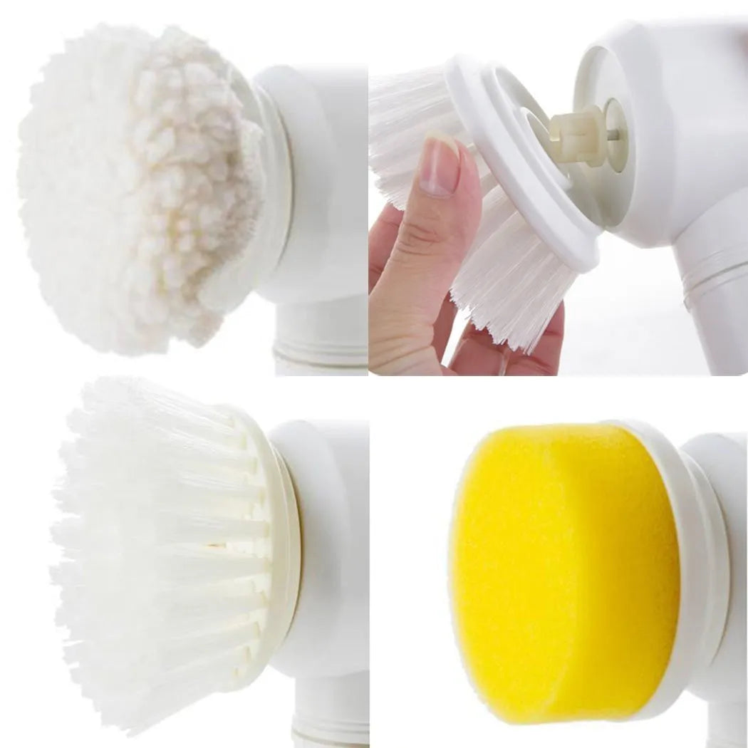 White handheld electric cleaning brush with three interchangeable nylon brush heads on a table.