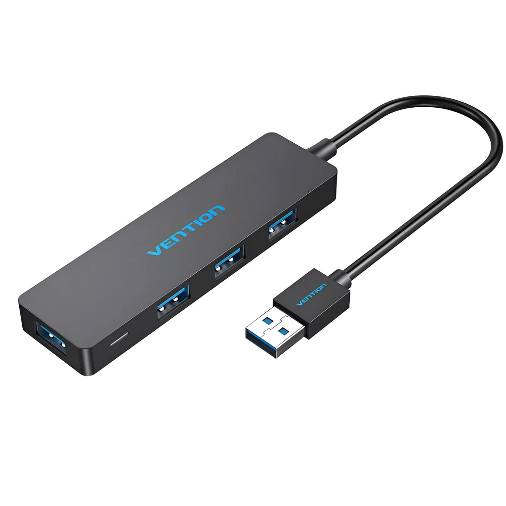 Black 4-port USB 3.0 hub with a short braided cable and nickel-plated connectors on a desk.