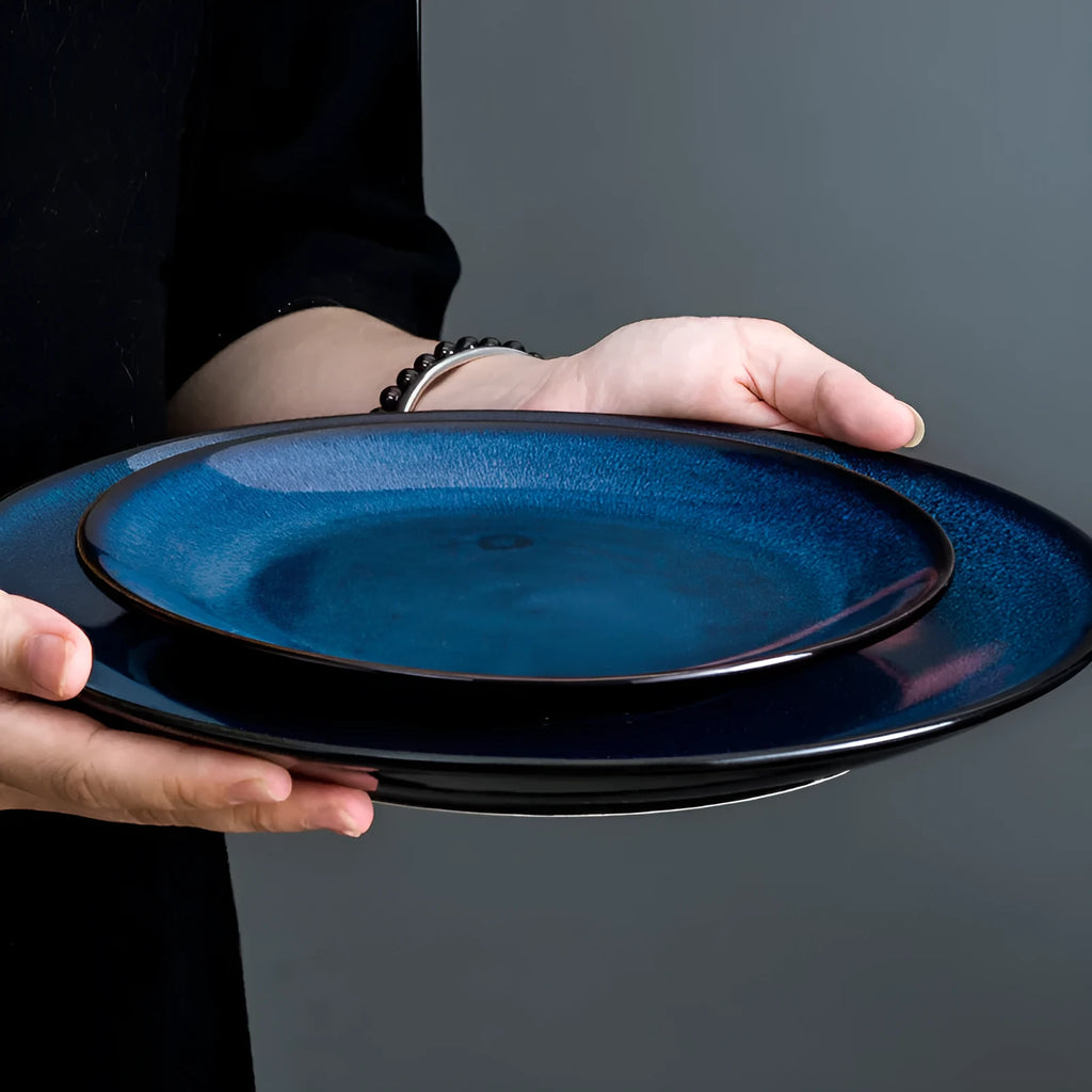 Blue Kiln Variation European-style porcelain shallow plate, 10 inch (25.2 cm) on table