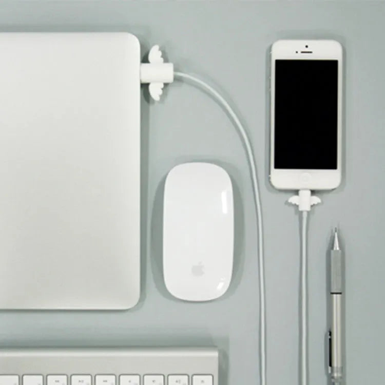 White and black silicone protective covers for mobile phone charging cables with size measurements