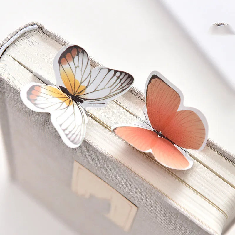 Butterfly-shaped paper bookmark measuring 13.5cm by 5.5cm with creative stationery design