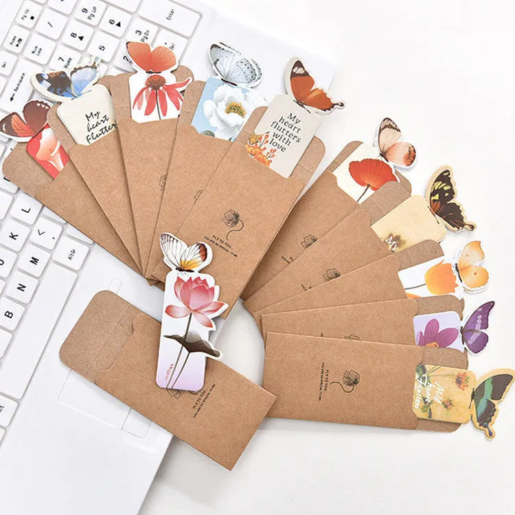 Butterfly-shaped paper bookmark measuring 13.5cm by 5.5cm with creative stationery design