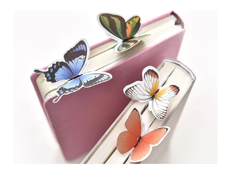 Butterfly-shaped paper bookmark measuring 13.5cm by 5.5cm with creative stationery design