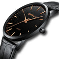 Casual quartz watch with alloy case, plexiglass crystal, and choice of black or gold mesh or leather strap.