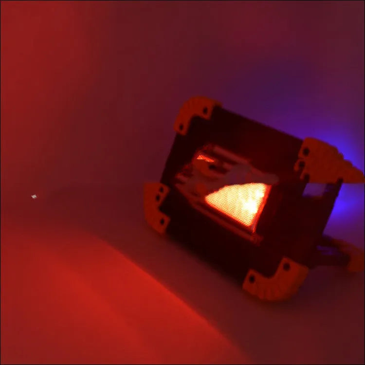 Rechargeable double square COB searchlight work light with dual battery options.