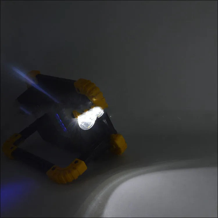 Rechargeable double square COB searchlight work light with dual battery options.