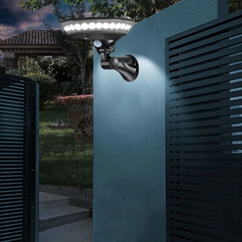 Outdoor solar-powered security light with 360-degree LEDs and a motion sensor in a white ABS housing.