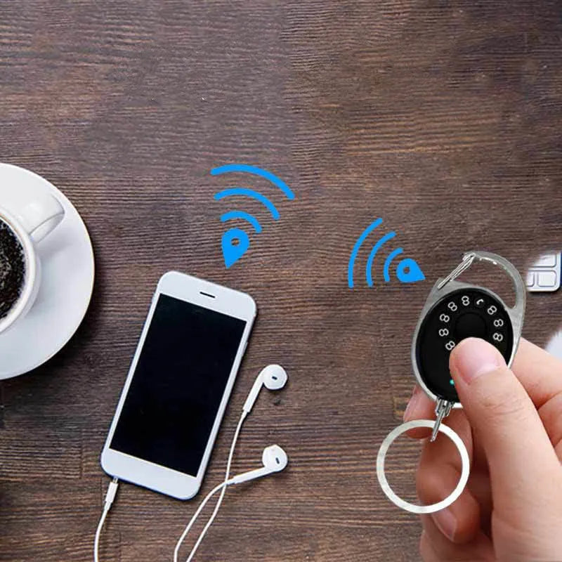 Black Bluetooth anti-lost tracking device with metal keychain loop and selfie function