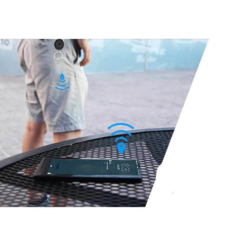 Black Bluetooth anti-lost tracking device with metal keychain loop and selfie function