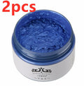 Hair colour wax pots in various shades including blue, gold, green, and red