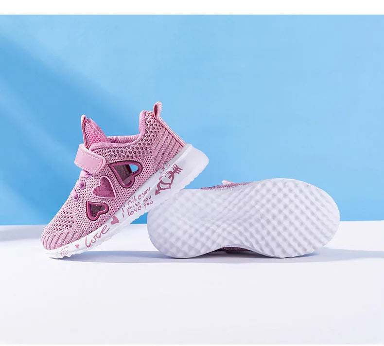Children's pink mesh sneakers with velcro fastening and cartoon patterns