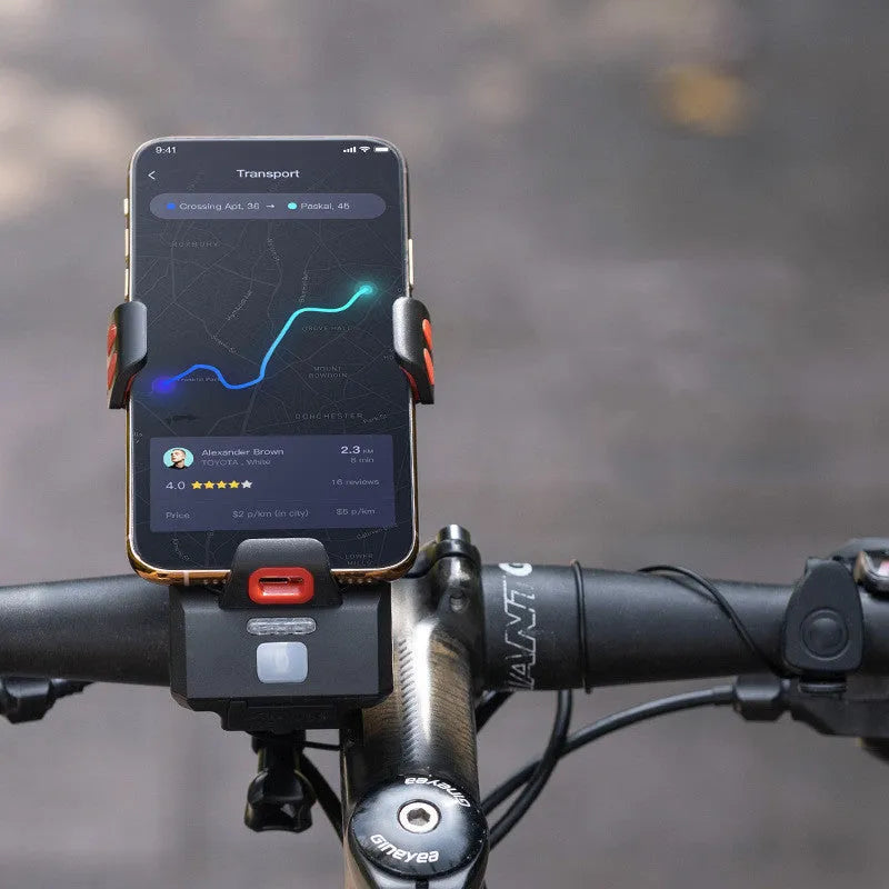 Black 4 in 1 cycling phone holder and front light with 4000mAh battery, mounted on handlebar