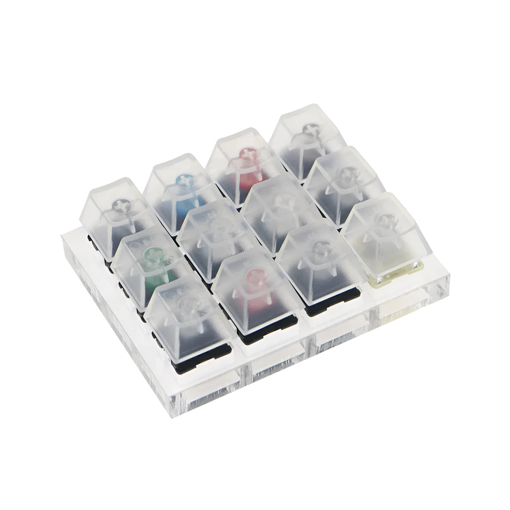 Cherry MX mechanical keyboard switch test kit with twelve different switches including Black, Green and Tea variants