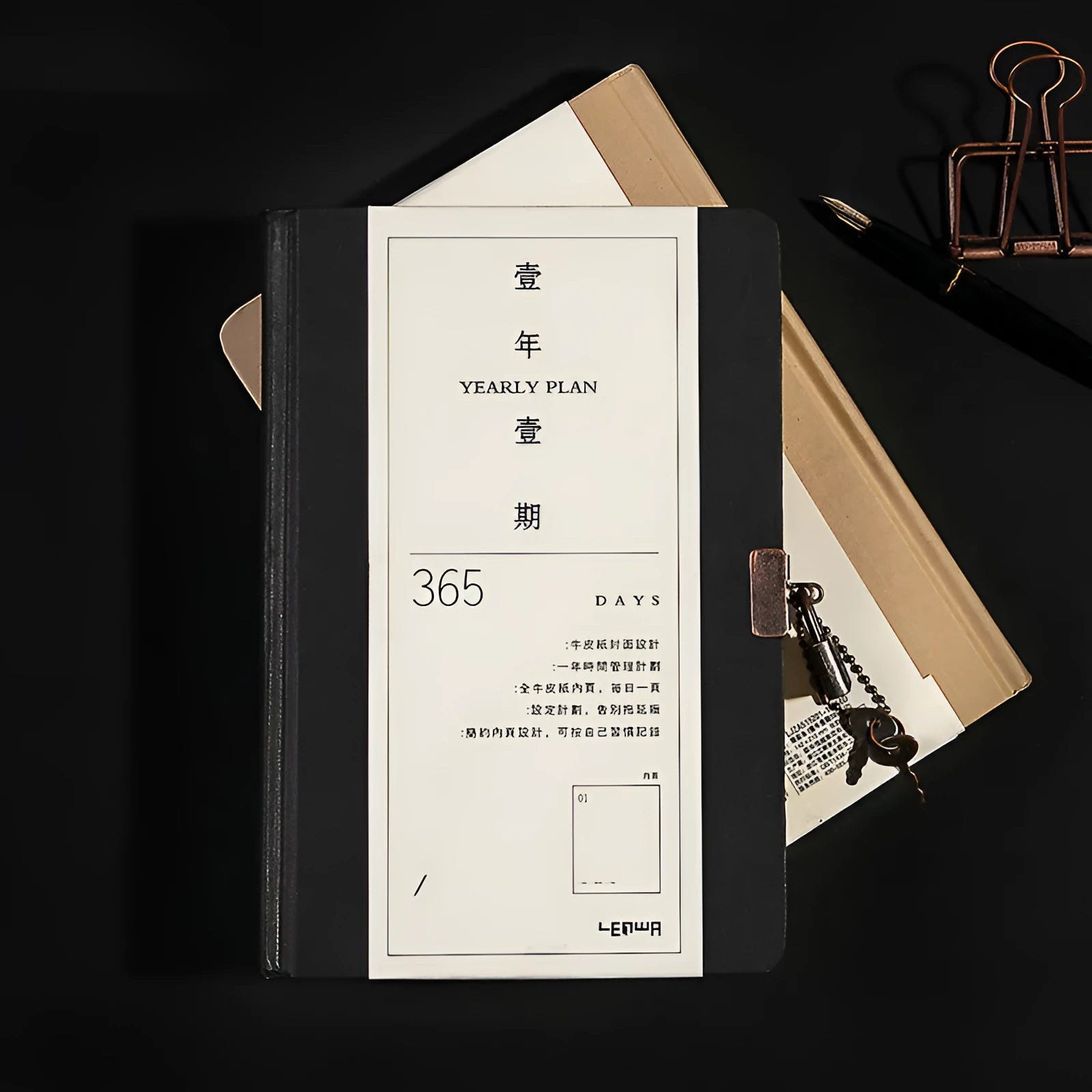 Hardcover A5 diary notebook with lock, shown in beige camel and ya black colour options.