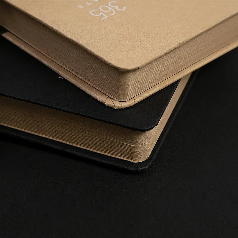 Hardcover A5 diary notebook with lock, shown in beige camel and ya black colour options.