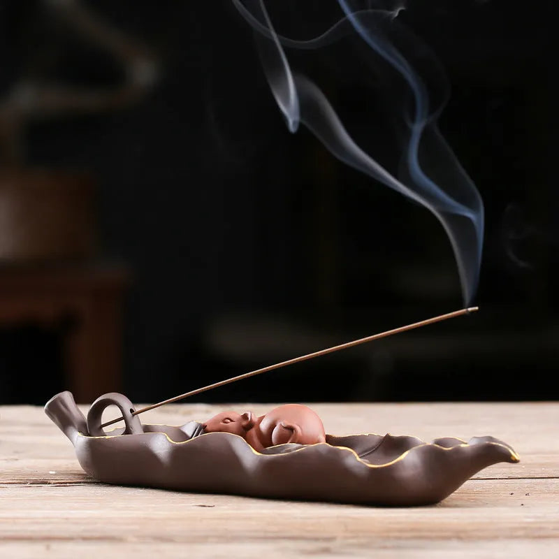 Purple clay ceramic lying incense burner with golden rat decorative design