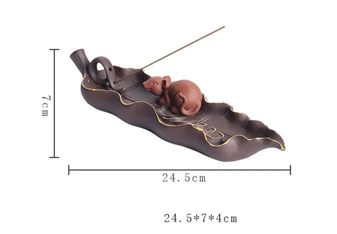 Purple clay ceramic lying incense burner with golden rat decorative design