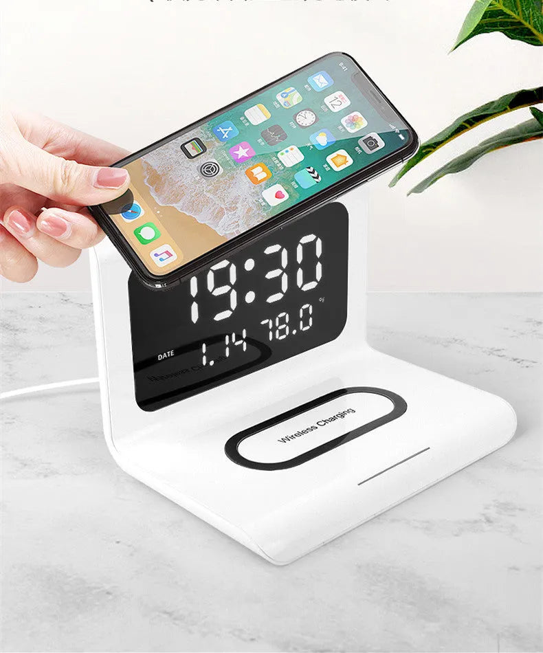 Wireless charger alarm clock with calendar display showing temperature and humidity readings