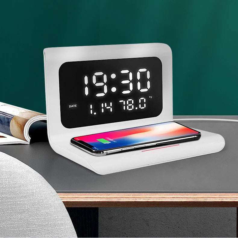 Wireless charger alarm clock with calendar display showing temperature and humidity readings