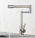 Silver stainless steel kitchen mixer tap with dual levers and rotating spout