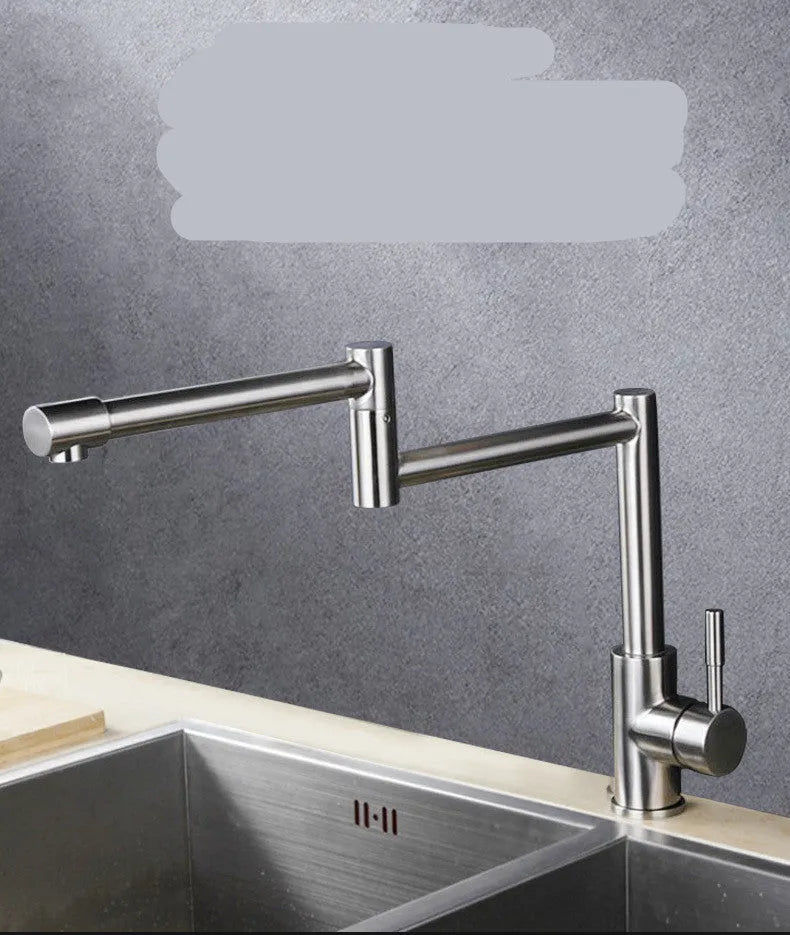 Silver stainless steel kitchen mixer tap with dual levers and rotating spout