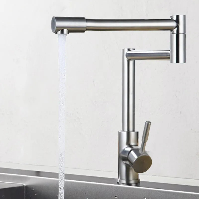 Silver stainless steel kitchen mixer tap with dual levers and rotating spout