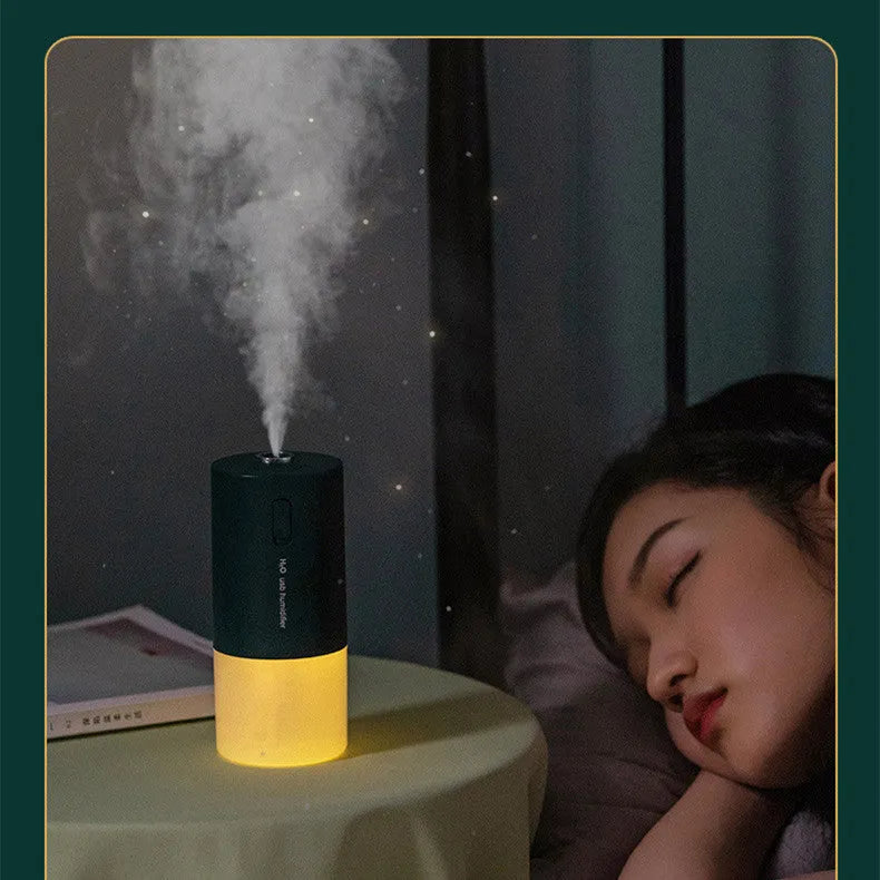 Blue columnar USB desktop humidifier with 1-litre water tank on wooden table