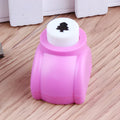 Plastic embossing device stationery toy for children, showing multiple colour and style options like bear and star.
