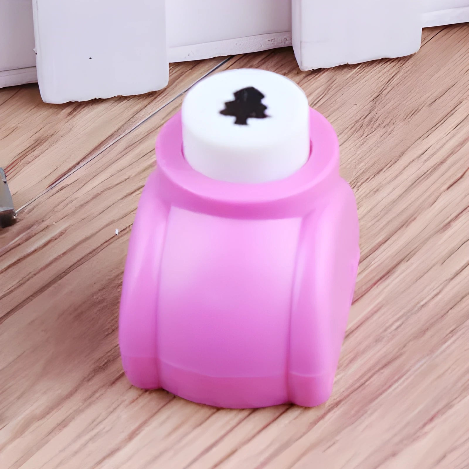 Plastic embossing device stationery toy for children, showing multiple colour and style options like bear and star.