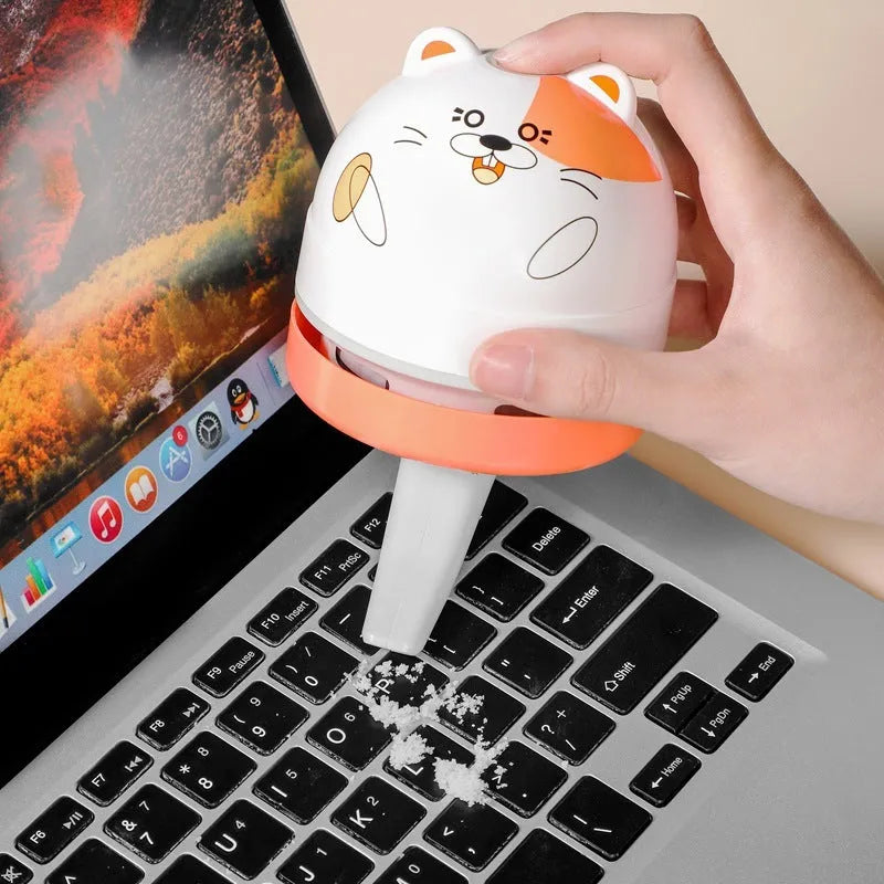 Mini desktop USB vacuum cleaner with flat nozzle attachment for keyboard cleaning