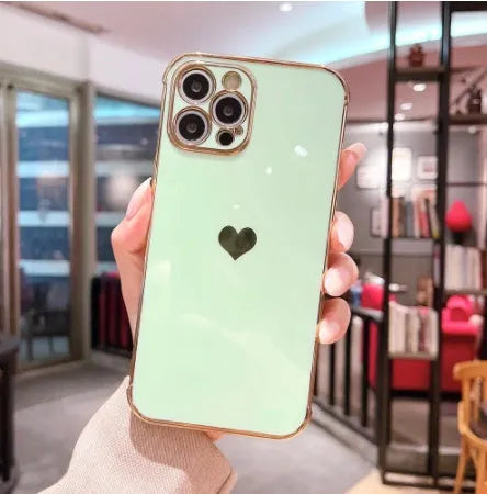 White iPhone back case with shiny electroplated love design on TPU material