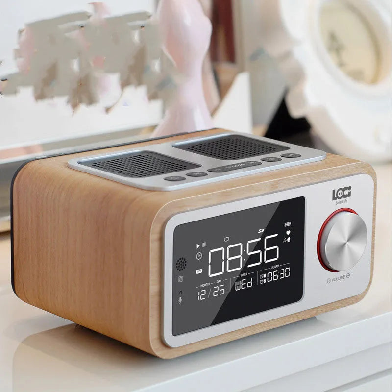 Wooden Bluetooth speaker alarm clock radio in golden oil colour showing front controls and speaker grilles