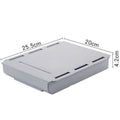 Grey Japanese style plastic storage box for stationery on a wooden desk.