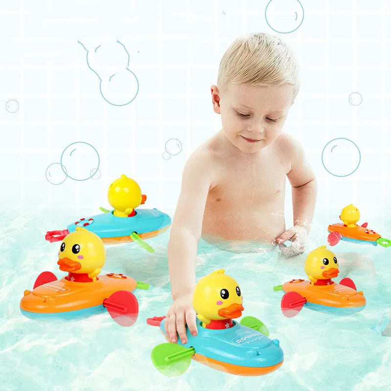 Yellow plastic wind-up swimming bath toy for children's water play