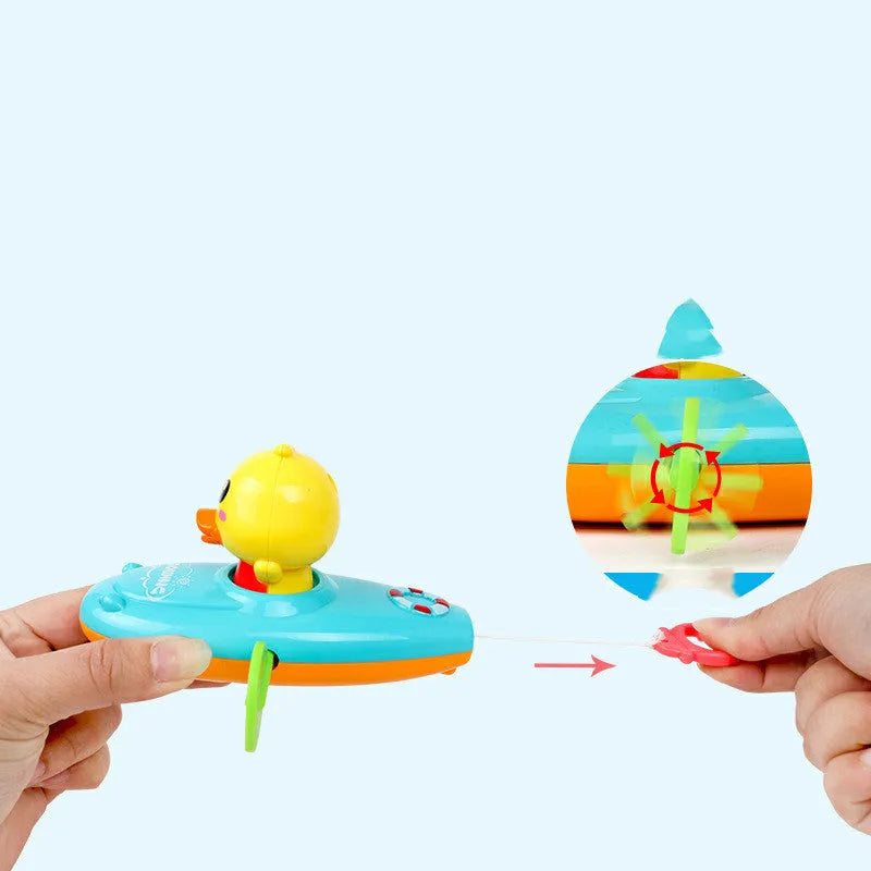 Yellow plastic wind-up swimming bath toy for children's water play