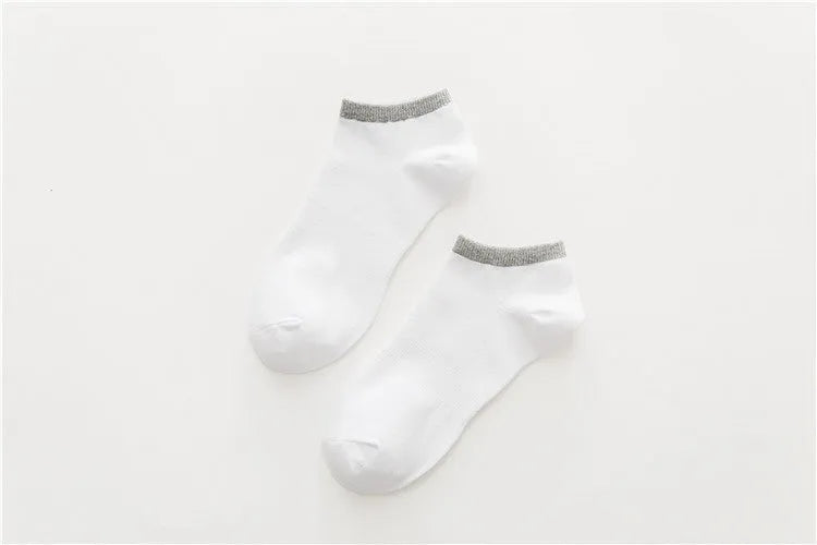 Pair of beige cotton boat socks with jacquard knit, invisible cut for low-profile wear