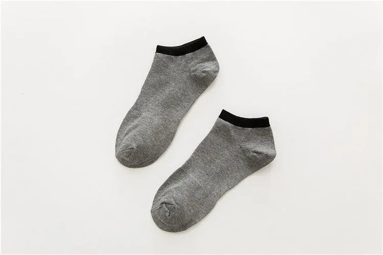 Pair of beige cotton boat socks with jacquard knit, invisible cut for low-profile wear
