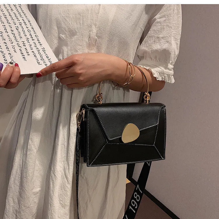 Women's contrast colour PU crossbody bag, small horizontal square shape, black colourway, with document pocket