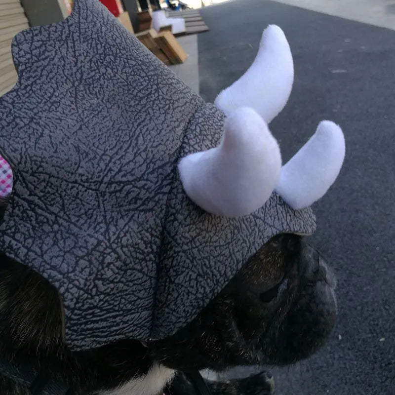 Grey cloth triceratops dinosaur hat on a pet dog or cat, one-size headgear costume accessory