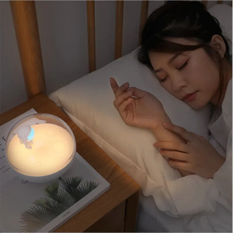 Modern USB-powered LED night light with plastic shade available in blue or white light colours
